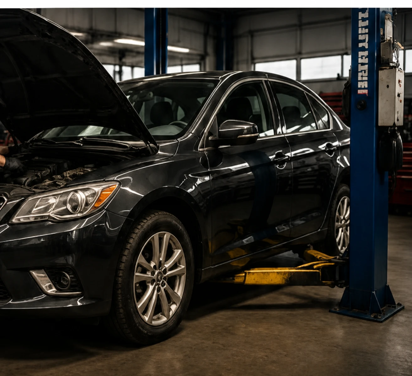 Technician servicing a vehicle at Northway Auto